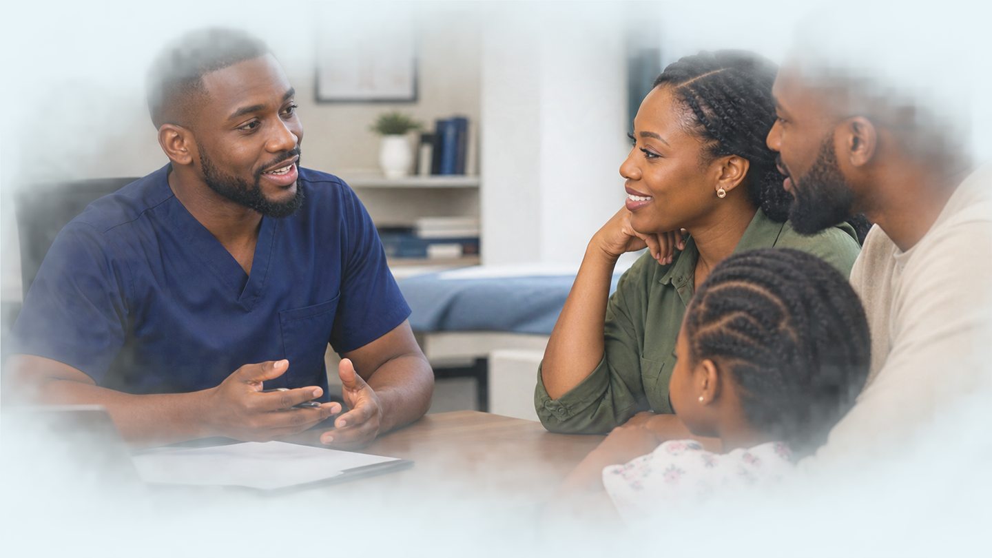 A clinician discussing care options with a Nigerian family